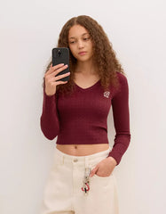 Cable-knit sweater with embroidery