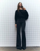 Flared pants with pocket flaps