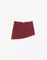 Asymmetric embroidered mini skirt