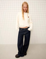 Cable-knit sweater with embroidery