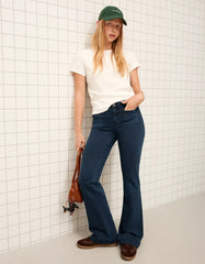 Flared pants with pocket flaps