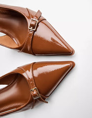 Kitten-heel shoes with buckled straps