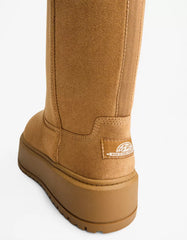 Platform boots with faux fur lining