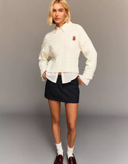 Cable-knit sweater with embroidery