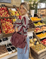 Worn-effect bowling bag with straps