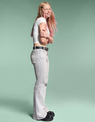 Flared pants with pocket flaps