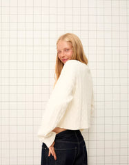 Cable-knit sweater with embroidery