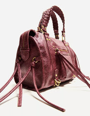 Worn-effect bowling bag with straps