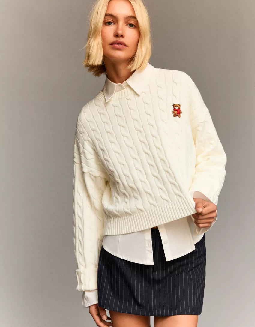 Cable-knit sweater with embroidery