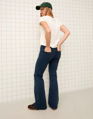 Flared pants with pocket flaps