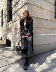 Coat with a detachable faux fur collar