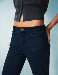 Flared pants with pocket flaps