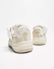Skater sneakers with butterfly details
