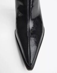 Heeled ankle boot with buckle strap