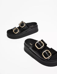 Flat platform sandals with buckles