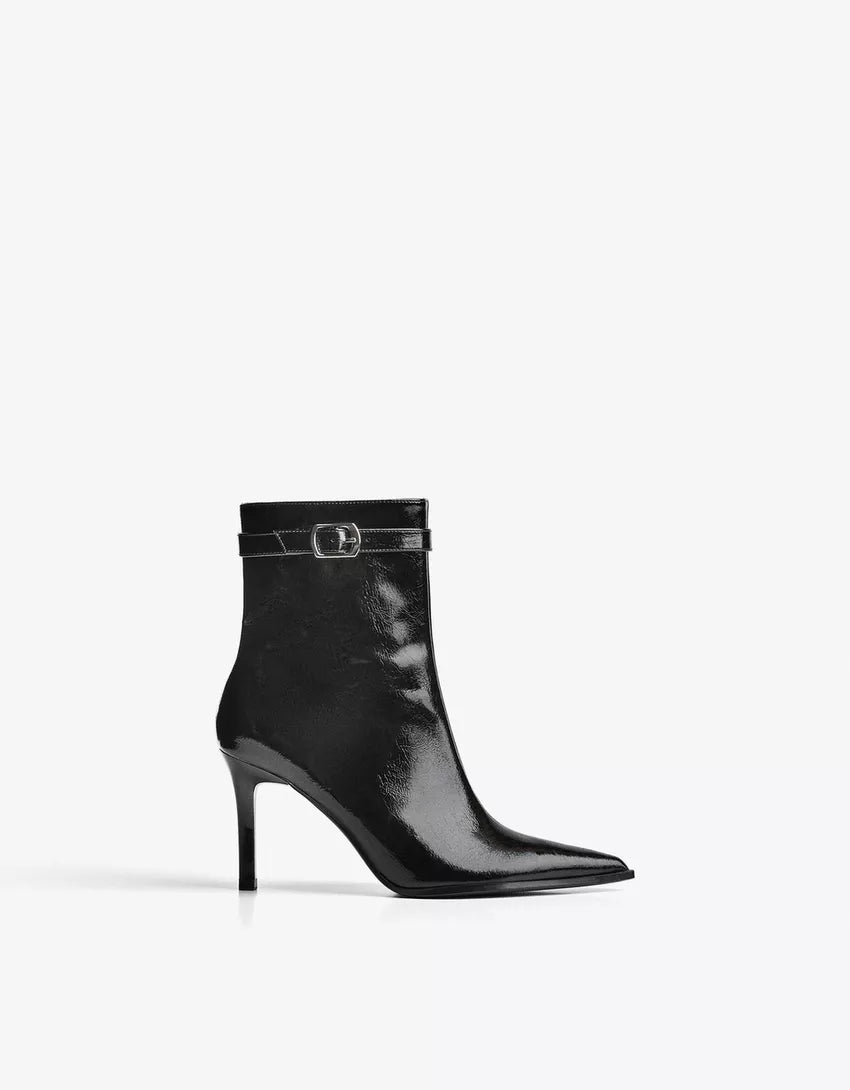 Heeled ankle boot with buckle strap