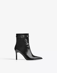 Heeled ankle boot with buckle strap