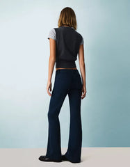 Flared pants with pocket flaps