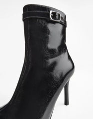 Heeled ankle boot with buckle strap