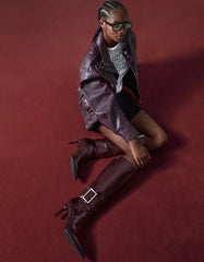 Heeled boots with buckle