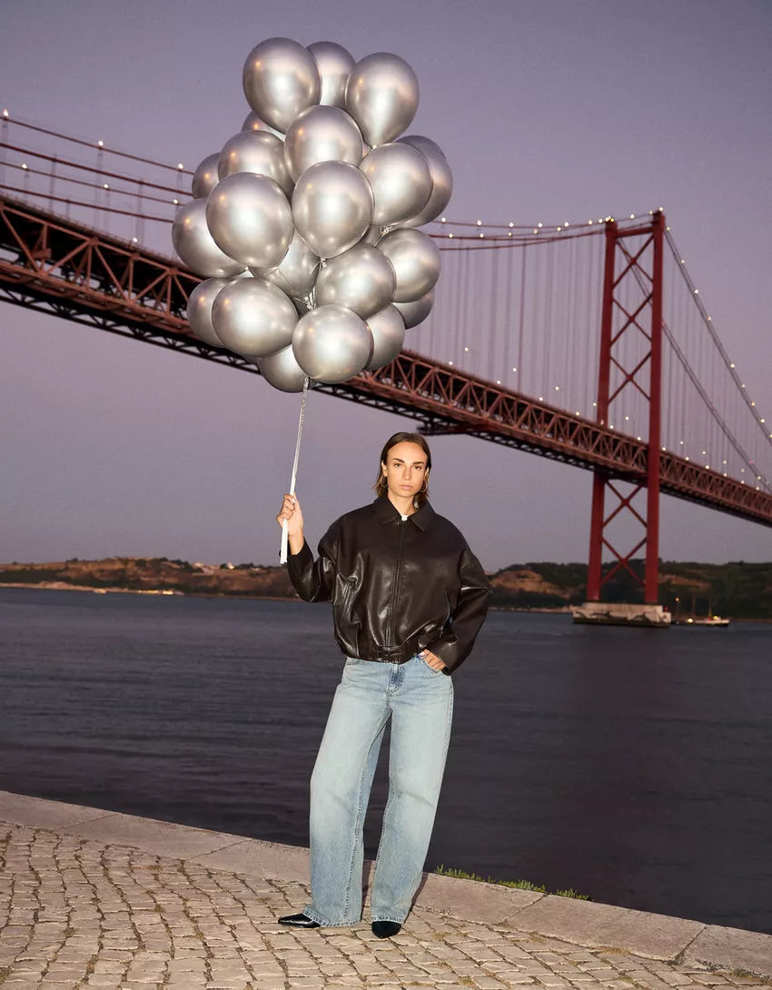 Belted leather effect bomber jacket