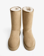 Platform boots with faux fur lining